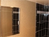 Earthy Wallpaper Brings Texture to Bathroom